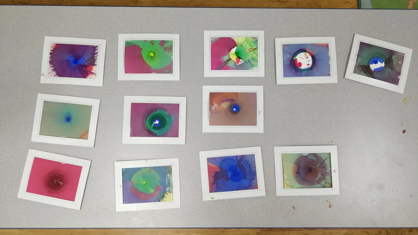 A collection of finished spin art cards